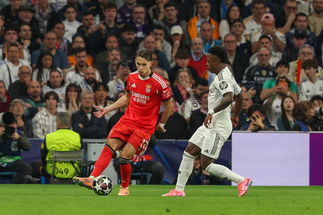 Madrid, Spain February 25, 2026 FBL UEFA Champions League 2025 26 Real Madrid SL Benfica Amar Dedic S L Benfica , Vinicius Junior Real Madrid in action, with the ball during the UEFA Champions League 2025 26 knockout play offs match between Real Madrid and SL Benfica at the Santiago Bernabà u Stadium on February 25, 2026 in Madrid, Spain Copyright: JoaquimxFerreira