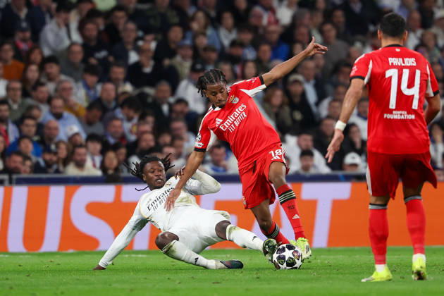 Madrid, Spain February 25, 2026 FBL UEFA Champions League 2025 26 Real Madrid SL Benfica Eduardo Camavinga Real Madrid , Leandro Barreiro S L Benfica battles for the Ball during the UEFA Champions League 2025 26 knockout play offs match between Real Madrid and SL Benfica at the Santiago Bernabà u Stadium on February 25, 2026 in Madrid, Spain Copyright: JoaquimxFerreira