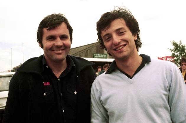 L to R): Seventh placed Alan Jones (AUS) stands alongside his Shadow team mate Riccardo Patrese (ITA), who retired from the race on lap 21 with low fuel pressure...British Grand Prix, Rd 10, Silverstone, England, 16 July 1977. Copyright: xSuttonxMotorsportsx