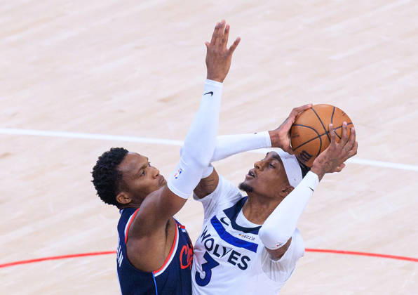 March 11, 2026, Inglewood, California, USA: Jaden McDaniels 3 of the Minnesota Timberwolves puts a shot over Bennedict Mathurin 9 of the LA Clippers during a 2026 NBA, Basketball Herren, USA regular season game on Wednesday March 11, 2026 at Intuit Dome Arena in Inglewood, California. JAVIER ROJAS PI Clippers Vs. Timberwolves - ZUMAp124 20260311_zaa_p124_051 Copyright: xJavierxRojasx