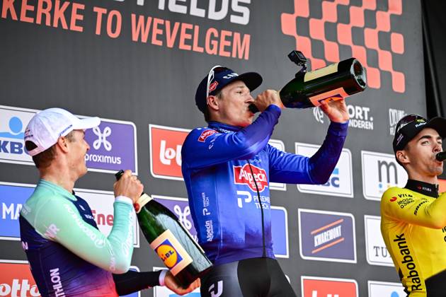 In Flanders Fields From Middelkerke to Wevelgem 2026 Cycling Race WEVELGEM, BELGIUM - MARCH 29 : Laporte Christophe (FRA) of Team Visma Lease a Bike, Andresen Tobias Lund (DEN) of Decathlon CMA CGM Team, Philipsen Jasper (BEL) of Alpecin Premier Tech celebrating his victory on the podium during the 88th edition of In Flanders Fields From Middelkerke to Wevelgem an UCI World Tour 1.UWT one day cycling road race for Men Elite of 240 km with start in Middelkerke and finish in Wevelgem on March 29, 2026 in Wevelgem, Belgium, 29 03 2026 ( Motordriver Guy De Vuyst - Wevelgem Belgium Copyright: xJanxDexMeuleneirx