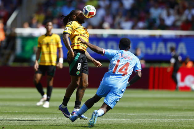 RD Congo v Jamaica - 2026 FIFA World Cup, WM, Weltmeisterschaft, Fussball Qualifying ZAPOPAN, MEXICO- MARCH 31: Noah Sadiki (R) of RD Congo fights for the ball with Kasey Palmer (L) of Jamaica during a World Cup 2026 playoff qualifying football match between RD Congo and Jamaica, at the Guadalajara Stadium in Zapopan, Mexico on March 31, 2026. Stringer Anadolu Zapopan Mexico. Editorial use only. Please get in touch for any other usage.  Copyright: x2026xAnadoluxStringerx