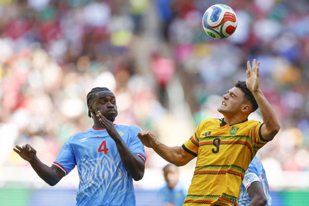 RD Congo v Jamaica - 2026 FIFA World Cup, WM, Weltmeisterschaft, Fussball Qualifying ZAPOPAN, MEXICO- MARCH 31: Axel Tuanzebe (L) of RD Congo fights for the ball with Bailey Cadamarteri (R) of Jamaica during a World Cup 2026 playoff qualifying football match between RD Congo and Jamaica, at the Guadalajara Stadium in Zapopan, Mexico on March 31, 2026. Stringer Anadolu Zapopan Mexico. Editorial use only. Please get in touch for any other usage.  Copyright: x2026xAnadoluxStringerx