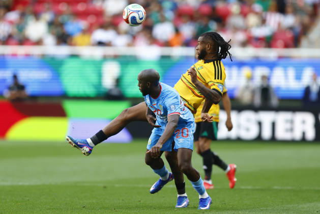 RD Congo v Jamaica - 2026 FIFA World Cup, WM, Weltmeisterschaft, Fussball Qualifying ZAPOPAN, MEXICO - MARCH 31: Yoane Wissa (L) of RD Congo fights for the ball with Kasey Palmer (R) of Jamaica during a World Cup 2026 playoff qualifying football match between RD Congo and Jamaica, at the Guadalajara Stadium in Zapopan, Mexico on March 31, 2026. Stringer Anadolu Zapopan Mexico. Editorial use only. Please get in touch for any other usage.  Copyright: x2026xAnadoluxStringerx