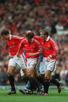 Manchester United, ManU V Everton, Premier League Ronny Johnsen, Gary Neville and David Beckham of Manchester United celebrate during the Premier League match between Manchester United and Everton at Old Trafford on March 21, 1999 in Manchester, England. Manchester Old Trafford England United Kingdom Copyright: xAllstarxPicturexLibraryxLtdx