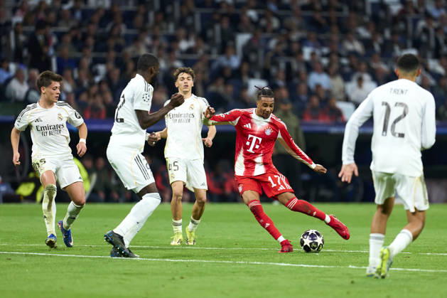 SOCCER-Matchday Round of Quarter-finals of UEFA Champions League match between Real Madrid CF and FC Bayern Munchen at Bernabeu Stadium on April 7, 2026. Michael Olise of FC Bayern Munchen battles for the ball with Antonio Rüdiger of Real Madrid CF during the UEFA Champions League match between Real Madrid CF and FC Bayern Munchen at Bernabeu Stadium on April 7, 2026. Madrid Madrid Spain EDITORIAL USE ONLY Copyright: xx SENISx-xCEBOLLAx xALFAQUIx dpphotos201576