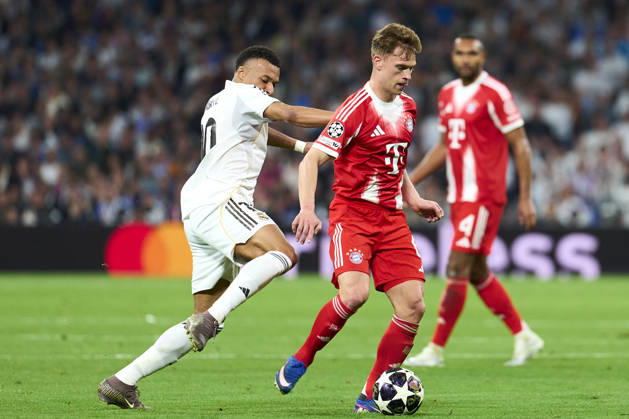 SOCCER-Matchday Round of Quarter-finals of UEFA Champions League match between Real Madrid CF and FC Bayern Munchen at Bernabeu Stadium on April 7, 2026. Joshua Kimmich of FC Bayern Munchen battles for the ball with Kylian Mbappe of Real Madrid CF during the UEFA Champions League match between Real Madrid CF and FC Bayern Munchen at Bernabeu Stadium on April 7, 2026. Madrid Madrid Spain EDITORIAL USE ONLY Copyright: xx SENISx-xCEBOLLAx xALFAQUIx dpphotos201577