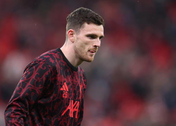 Liverpool, England, 14th April 2026. Andrew Robertson of Liverpool warms up before the Liverpool vs Paris Saint Germain UEFA Champions League quarter final 2nd leg match at Anfield, Liverpool. Picture credit should read: Jessica Hornby Sportimage EDITORIAL USE ONLY. No use with unauthorised audio, video, data, fixture lists, club league logos or live services. Online in-match use limited to 120 images, no video emulation. No use in betting, games or single club league player publications. SPI_038_JH_Liverpool_PSG SPI-4687-0037