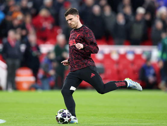 Liverpool, England, 14th April 2026. Andrew Robertson of Liverpool warms up before the Liverpool vs Paris Saint Germain UEFA Champions League quarter final 2nd leg match at Anfield, Liverpool. Picture credit should read: Jessica Hornby Sportimage EDITORIAL USE ONLY. No use with unauthorised audio, video, data, fixture lists, club league logos or live services. Online in-match use limited to 120 images, no video emulation. No use in betting, games or single club league player publications. SPI_040_JH_Liverpool_PSG SPI-4687-0039