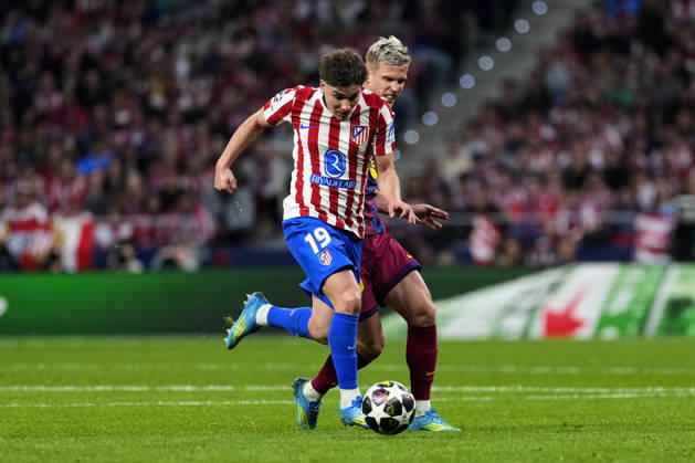 SOCCER-Matchday Round of Quarter-finals of UEFA Champions League match between Atletico de Madrid and FC Barcelona, Barca at Riyadh Air Metropolitano on April 14, 2026. Julian Alvarez of Atletico de Madrid battles for the ball with Dani Olmo of FC Barcelona during the UEFA Champions League match between Atletico de Madrid and FC Barcelona at Riyadh Air Metropolitano on April 14, 2026. Madrid Madrid Spain EDITORIAL USE ONLY Copyright: xx SENISx-xCEBOLLAx xALFAQUIx dpphotos201627