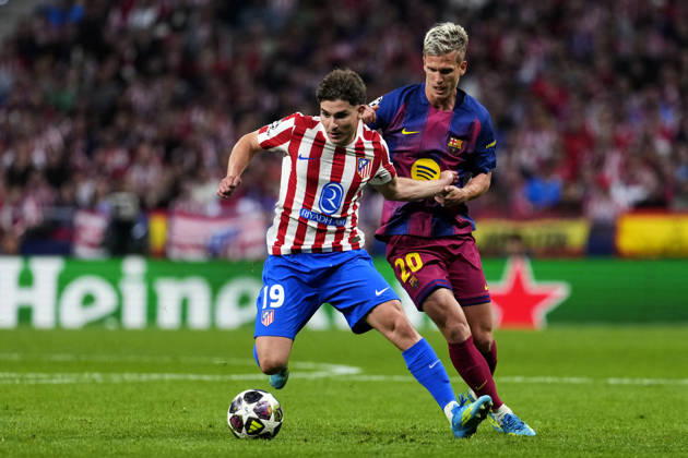 SOCCER-Matchday Round of Quarter-finals of UEFA Champions League match between Atletico de Madrid and FC Barcelona, Barca at Riyadh Air Metropolitano on April 14, 2026. Julian Alvarez of Atletico de Madrid battles for the ball with Dani Olmo of FC Barcelona during the UEFA Champions League match between Atletico de Madrid and FC Barcelona at Riyadh Air Metropolitano on April 14, 2026. Madrid Madrid Spain EDITORIAL USE ONLY Copyright: xx SENISx-xCEBOLLAx xALFAQUIx dpphotos201634