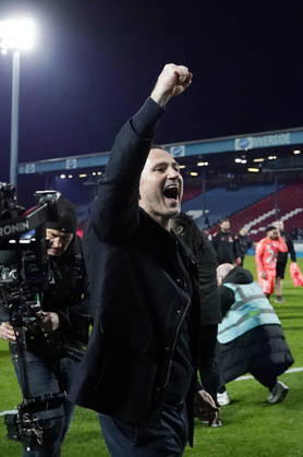 Blackburn, England, 17th April 2026. Frank Lampard manager of Coventry City celebrates promotion to the Premier League during the Blackburn Rovers vs Coventry City Sky Bet Championship match at Ewood Park, Blackburn. Picture credit should read: Andrew Yates Sportimage EDITORIAL USE ONLY. No use with unauthorised audio, video, data, fixture lists, club league logos or live services. Online in-match use limited to 120 images, no video emulation. No use in betting, games or single club league player publications. SPI_039_AY_BBurn_Cov SPI-4694-0042