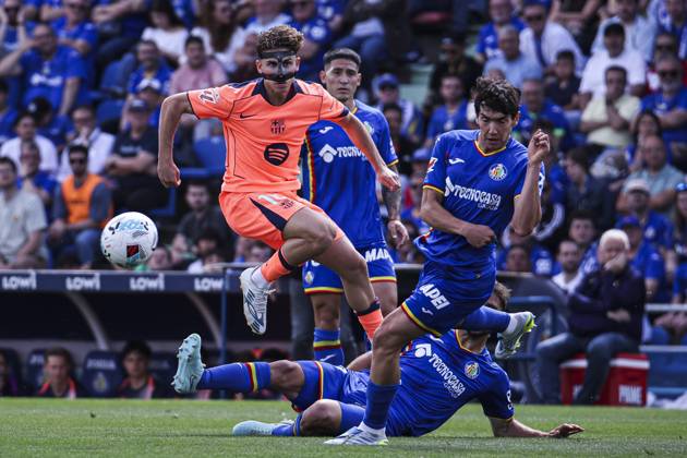25 April 2026; Estadio Coliseum, Madrid, Spain; La Liga Football, Getafe CF versus FC Barcelona, Barca Fermin Lopez with the ball and is defended by Mario Martin and Djene Dakonam Getafe vs FC Barcelona 900 Cordon Press 900 CordonxPress LOF - Getafe vs FC Barcelona