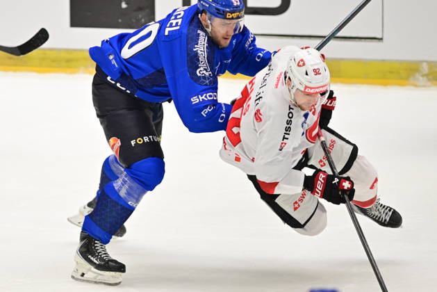 Czech Hockey Games, part of Euro Hockey tour series match Czech Republic vs. Switzerland in Ceske Budejovice, May 3, 2026. From left Czech Marcel Marcel, Gaetan Haas of Switzerland. (CTKxPhoto VaclavxPancer) CTKPhotoP2026050304226  CTKPhotoP2026050304226