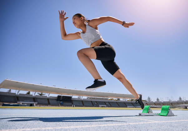 Woman runner, running and training on track, workout and exercise for race, marathon and in stadium. Speed, sports and fitness athlete with cardio, sprinter and fast run for Olympics event. (License=RF) 19962291 ,model released, Symbolfoto Copyright: xZoonar.com YurixArcursxpeopleimages.comx 19962291 ,model released, Symbolfoto ,property released