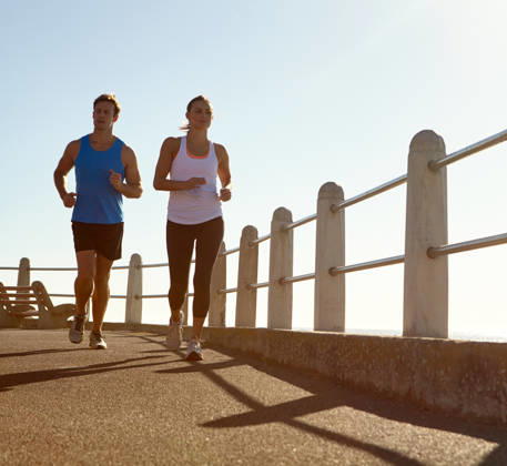 In it for the long run. a young couple jogging together the promenade (License=RF) 20136259 ,model released, Symbolfoto  Copyright: xZoonar.com KasperxRavlox 20136259 ,model released, Symbolfoto ,property released