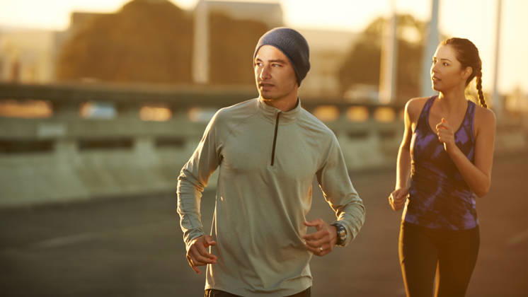 Enjoying a morning jog. two friends jogging down a road in the early morning (License=RF) 20279508 ,model released, Symbolfoto  Copyright: xZoonar.com KasperxRavlox 20279508 ,model released, Symbolfoto ,property released