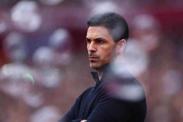 London, England, 10th May 2026. Mikel Arteta, Manager of Arsenal looks through the bubbles during the West Ham United vs Arsenal Premier League match at the London Stadium, London. Picture credit should read: Paul Terry Sportimage EDITORIAL USE ONLY. No use with unauthorised audio, video, data, fixture lists, club league logos or live services. Online in-match use limited to 120 images, no video emulation. No use in betting, games or single club league player publications. SPI_011_PT_West_Ham_Arsenal SPI-4793-0011