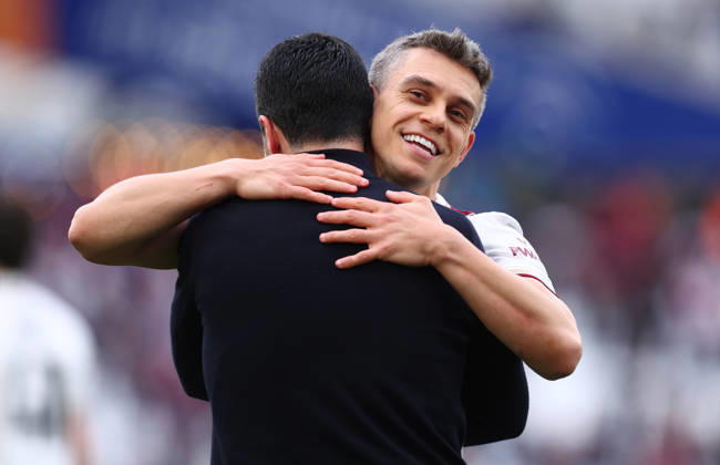 London, England, 10th May 2026. Mikel Arteta, Manager of Arsenal celebrates with Leandro Trossard of Arsenal after the West Ham United vs Arsenal Premier League match at the London Stadium, London. Picture credit should read: Paul Terry Sportimage EDITORIAL USE ONLY. No use with unauthorised audio, video, data, fixture lists, club league logos or live services. Online in-match use limited to 120 images, no video emulation. No use in betting, games or single club league player publications. SPI_085_PT_West_Ham_Arsenal SPI-4793-0085