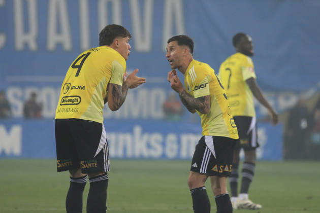 May 17, 2026, Craiova, Romania, Superliga Season 2025-2026, Play-Off, Stage 9, Universitatea Craiova vs FC Universitatea Cluj, Ion Oblemenco stadium, Craiova, Romania 94 Ovidiu Bic and 4 Andrei Coubis fight after recieving a goal
