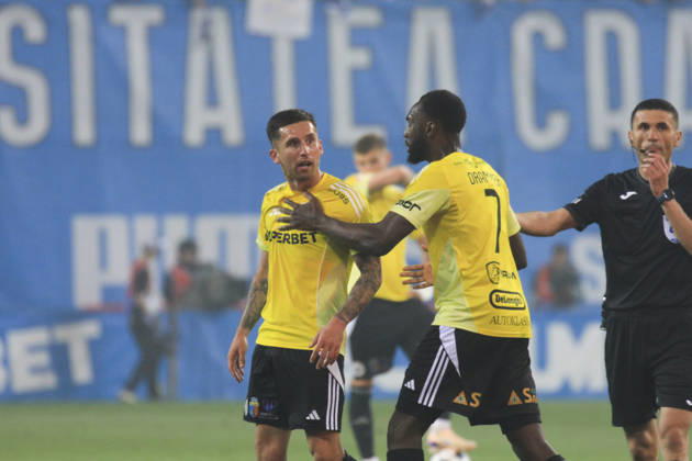 May 17, 2026, Craiova, Romania, Superliga Season 2025-2026, Play-Off, Stage 9, Universitatea Craiova vs FC Universitatea Cluj, Ion Oblemenco stadium, Craiova, Romania 94 Ovidiu Bic and 4 Andrei Coubis fight after recieving a goal