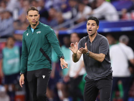 Budapest, Hungary, 30th May 2026. Mikel Arteta manager of Arsenal is told to get back into the technical box by the fourth official during the Paris Saint Germain vs Arsenal UEFA Champions League Final match at Puskas Arena, Budapest. Picture credit should read: David Klein Sportimage EDITORIAL USE ONLY. No use with unauthorised audio, video, data, fixture lists, club league logos or live services. Online in-match use limited to 120 images, no video emulation. No use in betting, games or single club league player publications. SPI_138_DK_PSG_Arsenal SPI-4828-0137