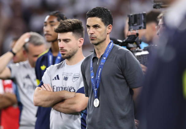 Budapest, Hungary, 30th May 2026. Mikel Arteta manager of Arsenal watches the PSG celebrations during the Paris Saint Germain vs Arsenal UEFA Champions League Final match at Puskas Arena, Budapest. Picture credit should read: David Klein Sportimage EDITORIAL USE ONLY. No use with unauthorised audio, video, data, fixture lists, club league logos or live services. Online in-match use limited to 120 images, no video emulation. No use in betting, games or single club league player publications. SPI_154_DK_PSG_Arsenal SPI-4828-0153
