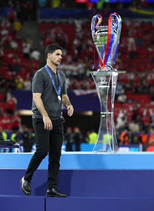 Budapest, Hungary, 30th May 2026. Mikel Arteta manager of Arsenal walks past the trophy during the Paris Saint Germain vs Arsenal UEFA Champions League Final match at Puskas Arena, Budapest. Picture credit should read: David Klein Sportimage EDITORIAL USE ONLY. No use with unauthorised audio, video, data, fixture lists, club league logos or live services. Online in-match use limited to 120 images, no video emulation. No use in betting, games or single club league player publications. SPI_194_DK_PSG_Arsenal SPI-4828-0192