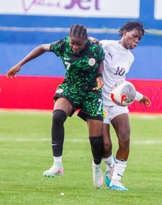 Nigeria v Guinea - 2026 FIFA U-17 Women s World Cup Qualifier Queen Joseph of Nigeria (left) competes for the ball with Nana Camara of Guinea during Nigeria s U-17 women s national team, Nationalteam the Flamingos, 6-0 (11-0 aggregate) victory over Guinea U-17 in the second leg of the 2026 FIFA U-17 Women s World Cup Qualifier at Remo Stadium in Ikenne, Ogun State, Nigeria, on May 31, 2026. The victory advances Nigeria to the final round of the qualifiers for the 2026 FIFA U-17 Women s World Cup in Morocco. Ikenne Nigeria  Copyright: xAdekunlexAjayix originalFilename:ajayi-notitle260531_npLqS
