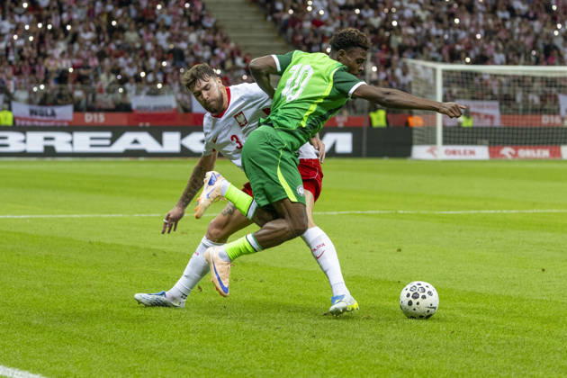 Poland - Nigeria 03.06.2026 football, Warsaw, PGE National Stadium, FIFA , friendly international game match Poland - Nigeria ( mecz towarzyski, pilka nozna, Polska - Nigeria ) image shows: Przemyslaw Wisniewski (L) Fisayo Dele-Bashiru (R) photo Katarzyna Plewczynska Fotostyk Copyright: xKatarzynaxPlewczynskax 20260603FCTKPKAPL7749