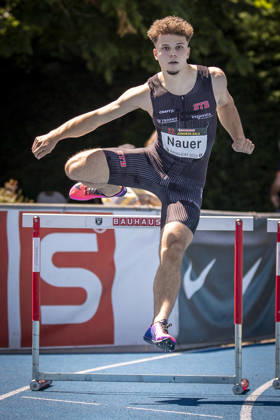 MANNHEIM, GERMANY - JUNE 13, 2026 : Jules Nauer (SUI Switzerland) competing in the men’s U20 400m hurdles during the Juniorengala 2026 at Michael-Hoffmann-Stadion on June 13, 2026 in Mannheim, Germany. Baden-Wuerttemberg Germany Copyright: xAxelxKohringx