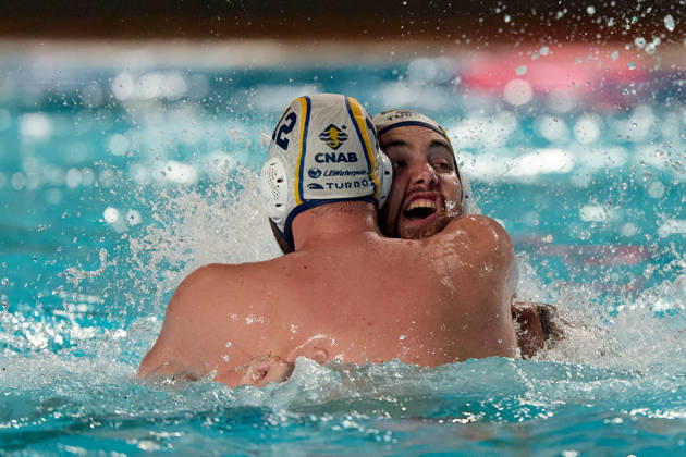 Alejandro Bustos Sanchez (left) of Zodiac CNAB reacts in celebration with a team-mate after winning the European Aquatics Men™s Water polo, Wasserball Champions League gold‘medal match against Pro Recco at the National Pool, Tal‘Qroqq, Malta, on 13 June 2026. Zodiac CNAB v Pro Recco - Men™s Water Polo Men Champions League 2026 Final; EA_CL_2026_MLT