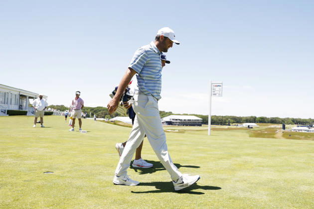 Scottie Scheffler walks to the 14th fairway while playing in a practice round on the Monday before the 126th U.S. Open Golf Championship at Shinnecock Hills Golf Club on Monday, June 15, 2026 in Southampton, New York.  NYP20260615305 JOHNxANGELILLO