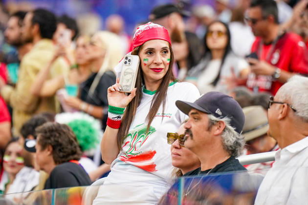 USA Soccer 2026 FIFA World Cup Group Stage Group G Iran vs. New Zealand SoFi Stadium, Inglewood, Los Angeles County, California An Iranian female fan watches the World Cup match from the stands. Wearing a fan jersey, face paint, and a headscarf in the national colors, she supports her team. The image symbolizes fan culture, passion, and support for the Iranian team at the 2026 FIFA World Cup,detected_source_language Copyright: xJOERANxSTEINSIEKx