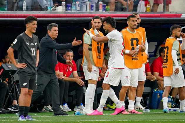 USA Soccer 2026 FIFA World Cup Group Stage Group G Iran vs. New Zealand SoFi Stadium Inglewood, Los Angeles County, California Goal and goal celebration following the 1-1 equalizer by Ramin Rezaeian (Iran 23), who runs toward coach Amir Ardeshir Ghalenoy to celebrate the goal,detected_source_language Copyright: xJOERANxSTEINSIEKx