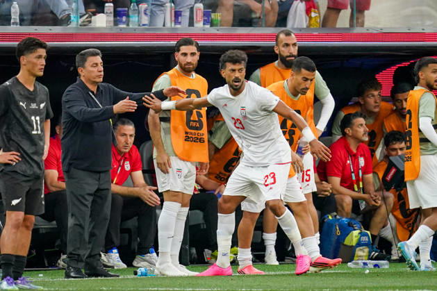 USA Soccer 2026 FIFA World Cup Group Stage Group G Iran vs. New Zealand SoFi Stadium Inglewood, Los Angeles County, California Goal and goal celebration following the 1-1 equalizer by Ramin Rezaeian (Iran 23), who runs toward coach Amir Ardeshir Ghalenoy to celebrate the goal,detected_source_language Copyright: xJOERANxSTEINSIEKx