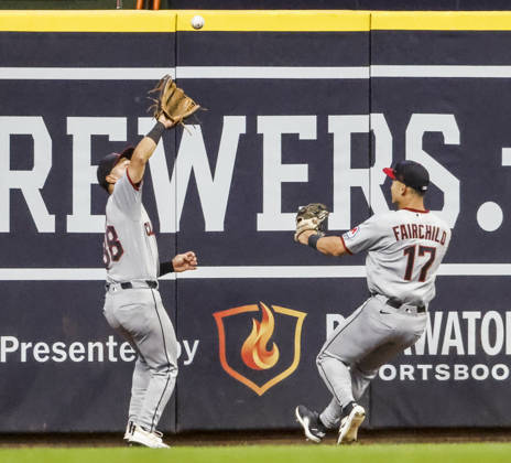 Cleveland Guardians center fielder Stuart Fairchild (L) watches as Cleveland Guardians left fielder Steven Kwan (R)catches a fly hit by Milwaukee Brewers left fielder Jackson Chourio in the first inning of the MLB, Baseball Herren, USA game between the Cleveland Guardians and the Milwaukee Brewers at American Family Field in Milwaukee, Wisconsin on Tuesday, June 16, 2026.  MIL20260616803 TANNENxMAURY
