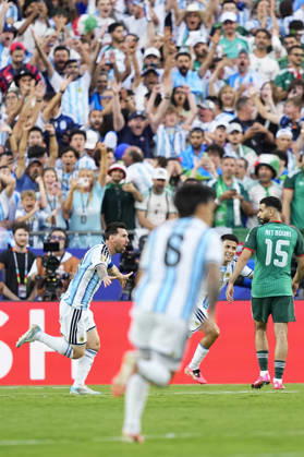 Football: 2026 World Cup Argentina s Lionel Messi (L) reacts after scoring the opening goal in the first half of a World Cup Group J football match against Algeria at Kansas City Stadium in Kansas City, Missouri, on June 16, 2026.  A14AA0005619115P