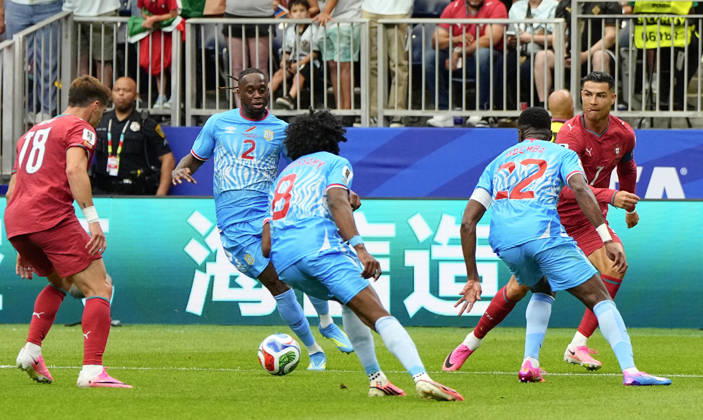 Football: 2026 World Cup Portugal s Cristiano Ronaldo (far R) passes the ball in the first half of a World Cup Group K football match against Congo DR at Houston Stadium in Houston, Texas, on June 17, 2026.  A14AA0005619248P