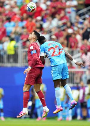 Football: 2026 World Cup Portugal s Cristiano Ronaldo (L) and Congo DR s Chancel Mbemba jump for the ball in the second half of a World Cup Group K football match at Houston Stadium in Houston, Texas, on June 17, 2026.  A14AA0005619250P