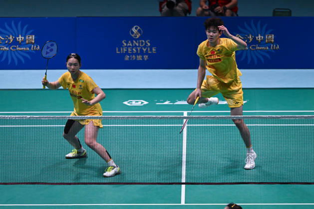 MACAO, CHINA - JUNE 19: Li Hongyi and Huang Kexin of China compete in the Mixed Doubles Quarterfinal match against Jiang Zhenbang and Wei Yaxin of China on day 4 of Macao Open Badminton 2026 at Macao East Asian Games Dome on June 19, 2026 in Macau, China.  Copyright: xVCGx 111649290089