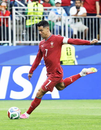 Football: 2026 World Cup Portugal s Cristiano Ronaldo scores the second of his two goals in the first half of a World Cup Group K football match against Uzbekistan at Houston Stadium in Houston on June 23, 2026.  A14AA0005620004P