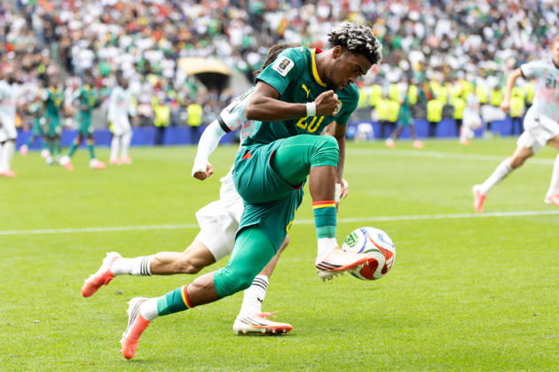 July 1, 2026, Seattle, Washington, USA: Senegal forward Ibrahim Mbaye (20) takes the ball by Belgium midfielder Diego Moreira (19) in overtime of the game Belgium national team, Nationalteam vs Senegal National Team for the FIFA World Cup, WM, Weltmeisterschaft, Fussball match, at Seattle Stadium. Belgium National Team Vs Senegal National Team - ZUMAl181 20260701_zsp_l181_196 Copyright: xMelissaxLevinx