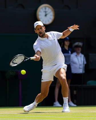 Novak Djokovic (SRB) in action during his match against Arthur Rinderknech (FRA) in the 2026 Wimbledon Championships at the AELTC London London All England Lawn Tennis and Croquet Club Wimbledon England, UK NEWSPAPERS OUT Copyright: xImmyxThompson-Bland IPSxPhotoxAgencyx
