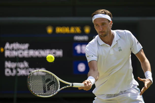 (260704) -- LONDON, July 4, 2026 -- Arthur Rinderknech of France returns the ball during the men s singles third round match against Novak Djokovic of Serbia at the Wimbledon Tennis Championships in London, Britain, on July 3, 2026. (Photo by Xinhua) (SP)BRITAIN-LONDON-TENNIS-WIMBLEDON-MEN S SINGLES StephenxChung 