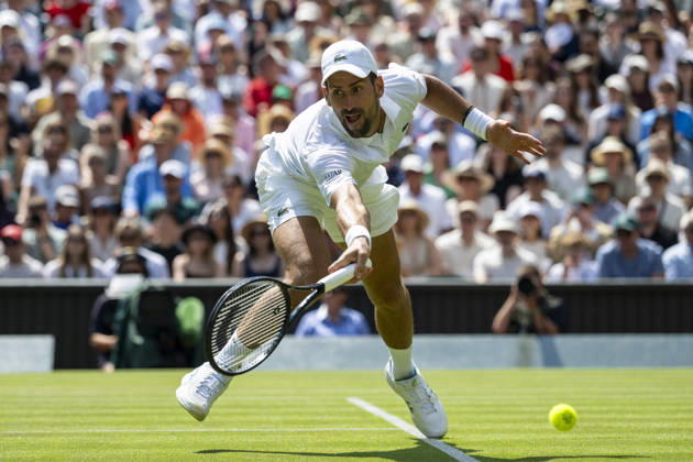(260704) -- LONDON, July 4, 2026 -- Novak Djokovic of Serbia returns the ball during the men s singles third round match against Arthur Rinderknech of France at the Wimbledon Tennis Championships in London, Britain, on July 3, 2026. (Photo by Xinhua) (SP)BRITAIN-LONDON-TENNIS-WIMBLEDON-MEN S SINGLES StephenxChung 