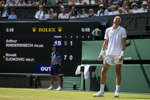 (260704) -- LONDON, July 4, 2026 -- Arthur Rinderknech of France reacts during the men s singles third round match against Novak Djokovic of Serbia at the Wimbledon Tennis Championships in London, Britain, on July 3, 2026. (Photo by Xinhua) (SP)BRITAIN-LONDON-TENNIS-WIMBLEDON-MEN S SINGLES StephenxChung 