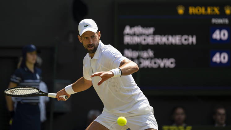 (260704) -- LONDON, July 4, 2026 -- Novak Djokovic of Serbia returns the ball during the men s singles third round match against Arthur Rinderknech of France at the Wimbledon Tennis Championships in London, Britain, on July 3, 2026. (Photo by Xinhua) (SP)BRITAIN-LONDON-TENNIS-WIMBLEDON-MEN S SINGLES StephenxChung 