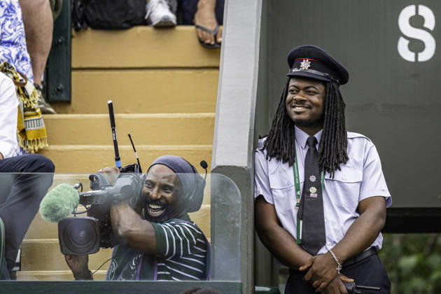 RECORD DATE NOT STATED 4th July 2026; All England Lawn Tennis and Croquet Club, London, England; Wimbledon Tennis Tournament, Day Six; A steward and cameraman enjoy the action on court GodfreyxPitt