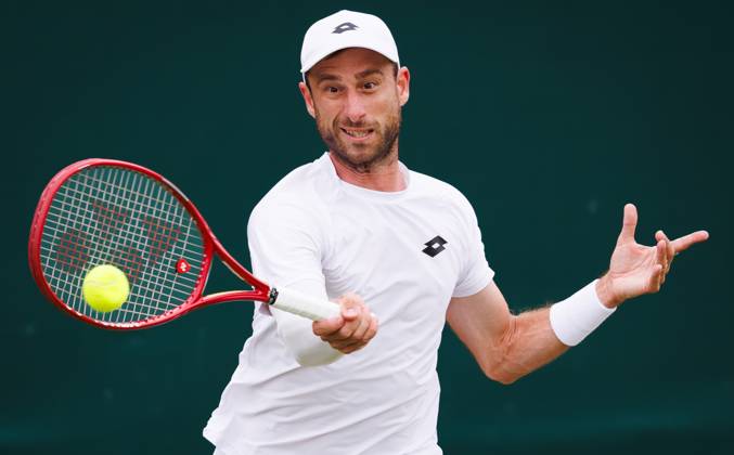 Belgian Sander Gille pictured in action during a doubles tennis match between Argentinian-Spain pair Zeballos - Granollers and Belgian-Dutch pair Gille-Verbeek, in the second round of the Men s doubles at the Wimbledon grand slam tennis tournament in London, Britain, Saturday 04 July 2026. BENOITxDOPPAGNE  x180331486x
